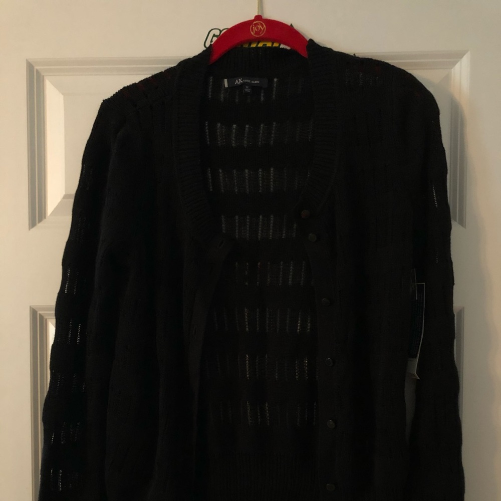 Black sweater.  Size M